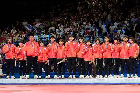 Team of Japan, bronze medalist in judo mixed team competition
